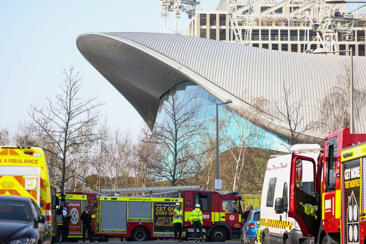 Emergency crews and vehicles are pictured outside the Queen Elizabeth Olympic Park following a leak of noxious fumes, in London, Britain March 23, 2022. REUTERS/Henry Nicholls