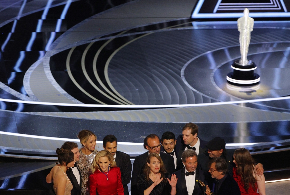 Philippe Rousselet, Fabrice Gianfermi and Patrick Wachsberger win the Oscar for Best Picture for 