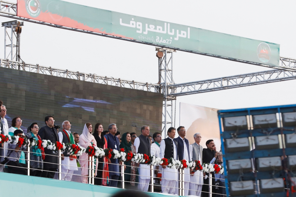Pakistani Prime Minister Imran Khan, chairman of the Pakistan Tehreek-e-Insaf (PTI) political party, along with party leaders attend a public rally in Islamabad, Pakistan March 27, 2022. Reuters/Akhtar Soomro