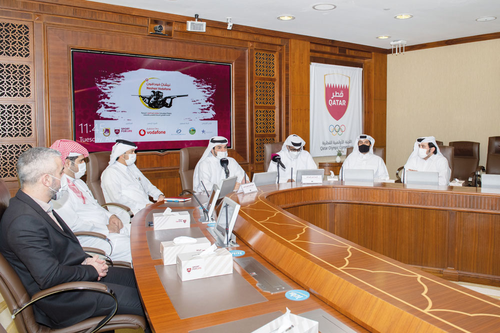 Officials of Qatar Shooting & Archery Association and Vodafone Qatar during a press conference held at the Qatar Olympic Committee headquarters.
