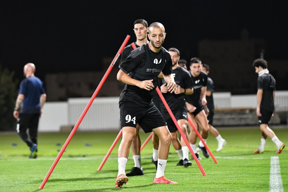 Al Gharafa's Sofiane Hanni trains with team-mates in Jeddah.