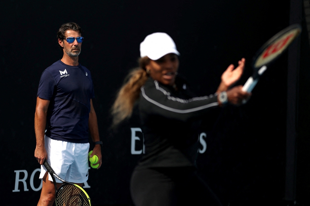 Melbourne Park, Melbourne, Australia, February 16, 2021 Serena Williams of the U.S. and her coach Patrick Mouratoglou during a practice session REUTERS/Loren Elliott/File Photo