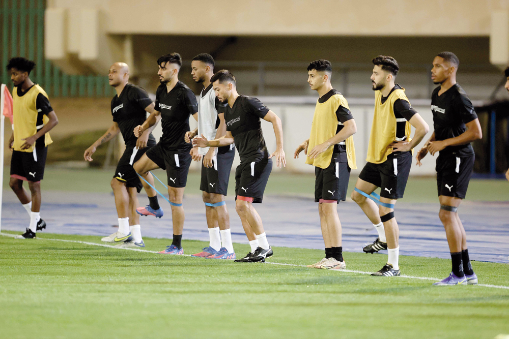 Al Sadd players during a training session, yesterday.