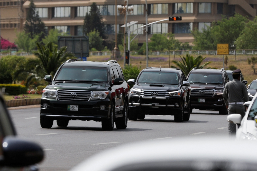 Vehicles escort leader of the opposition Mian Muhammad Shehbaz Sharif, and front-runner to become Pakistan's next Prime Minister, as he arrives at the Parliament House building in Islamabad, Pakistan April 11, 2022. REUTERS/Akhtar Soomro
 