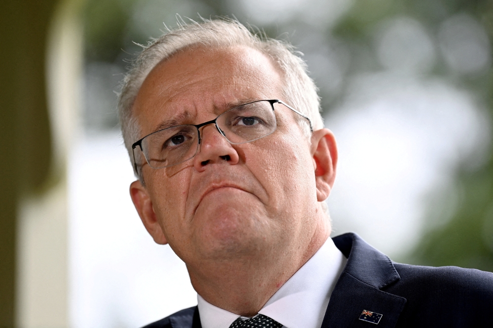 File photo: Australia's Prime Minister Scott Morrison reacts as he speaks to the media during a press conference at Kirribilli House in Sydney, Australia, February 24, 2022. AAP Image/Bianca De Marchi via Reuters
