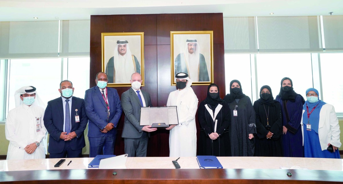 Public Health Department Director, MoPH, Sheikh Dr. Mohammed bin Hamad Al Thani; Nicholas Boucher, Head of the Science and Innovation Network, British Embassy in Doha; and other officials at the agreement-signing ceremony. 