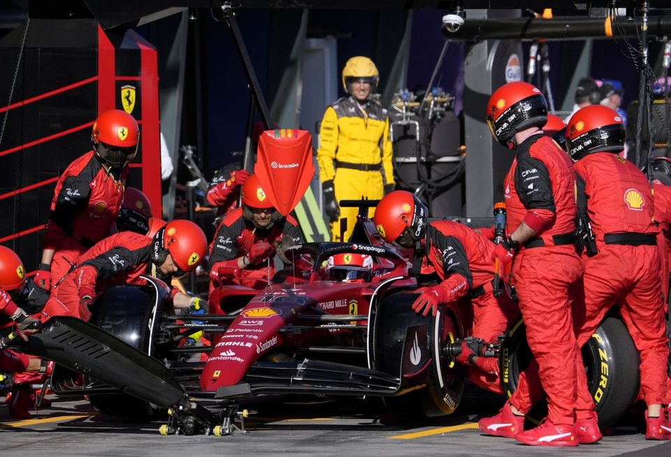 April 10, 2022 Ferrari's Charles Leclerc's pit crew in action during the race Pool via REUTERS/Simon Baker


