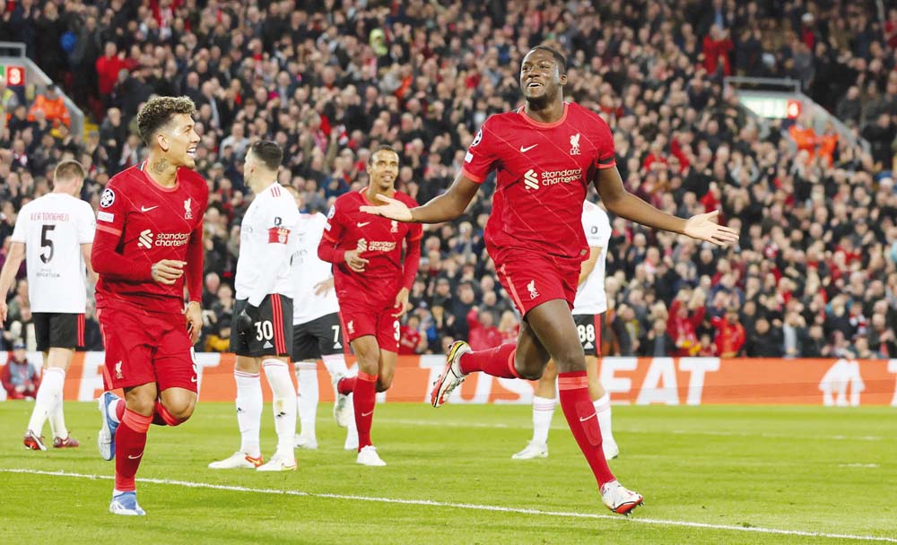 Liverpool’s Ibrahima Konate (right) celebrates after scoring their first goal with Roberto Firmino. 