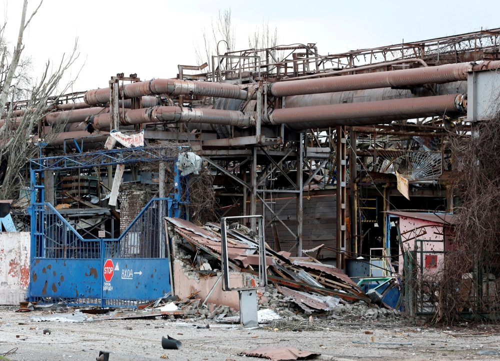 A view shows the gates of the Illich Steel and Iron Works damaged during Ukraine-Russia conflict in the southern port city of Mariupol, Ukraine April 15, 2022. Reuters/Alexander Ermochenko/File Photo