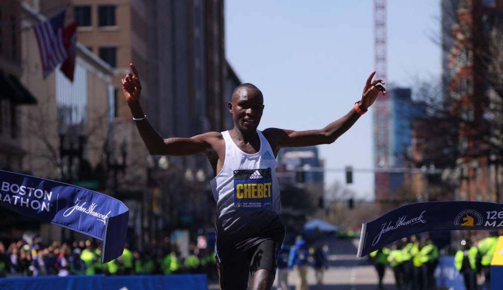 April 18, 2022 Kenya's Evans Chebet celebrates winning the elite men's race REUTERS/Brian Snyder