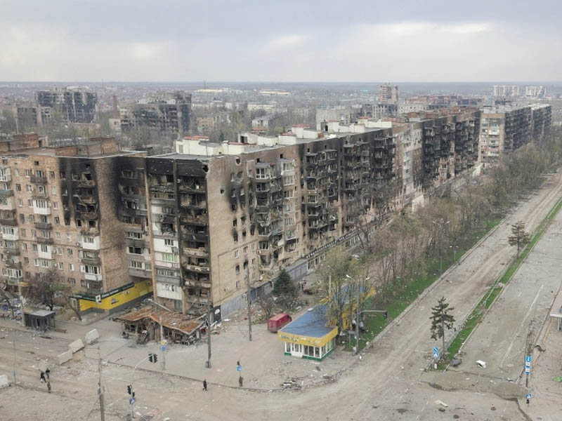An aerial view shows residential buildings damaged during Ukraine-Russia conflict in the southern port city of Mariupol, Ukraine April 18, 2022. Picture taken with a drone. REUTERS/Pavel Klimov
