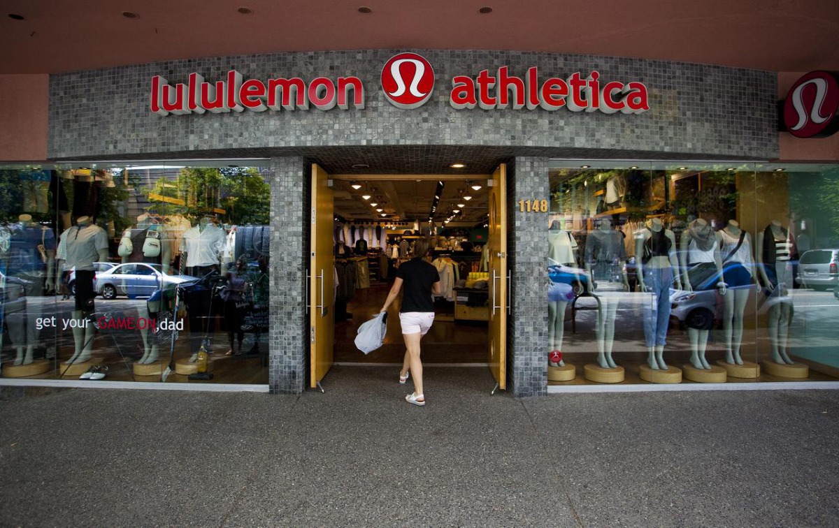 A woman walks into a store of yogawear retailer Lululemon Athletica in downtown Vancouver June 11, 2014. Reuters/Ben Nelms

