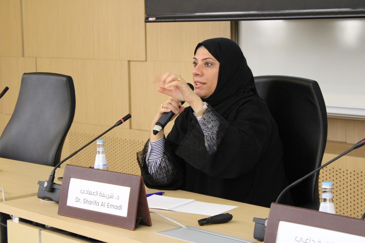 Dr. Sharifa Noaman Al Emadi presenting a lecture. 