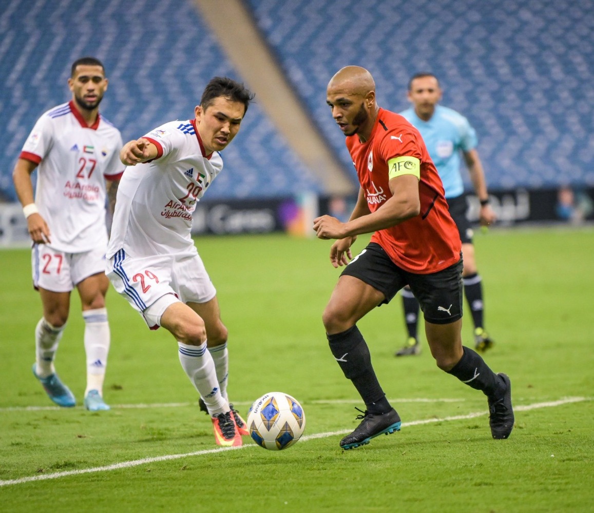 Al Rayyan captain Yacine Brahimi (right) in action.