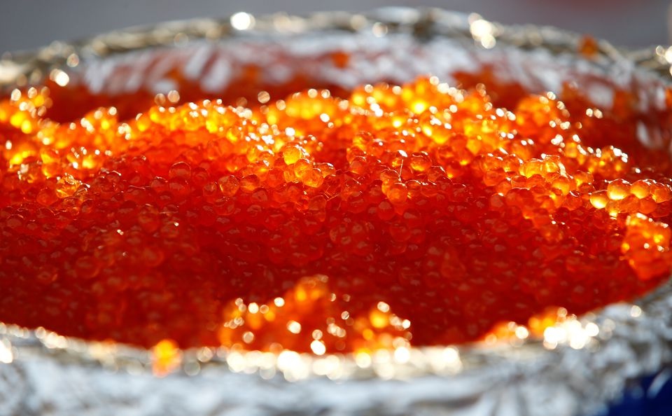 The red caviar is on display at the food court during the Eastern Economic Forum in Vladivostok, Russia September 6, 2017. REUTERS/Sergei Karpukhin


