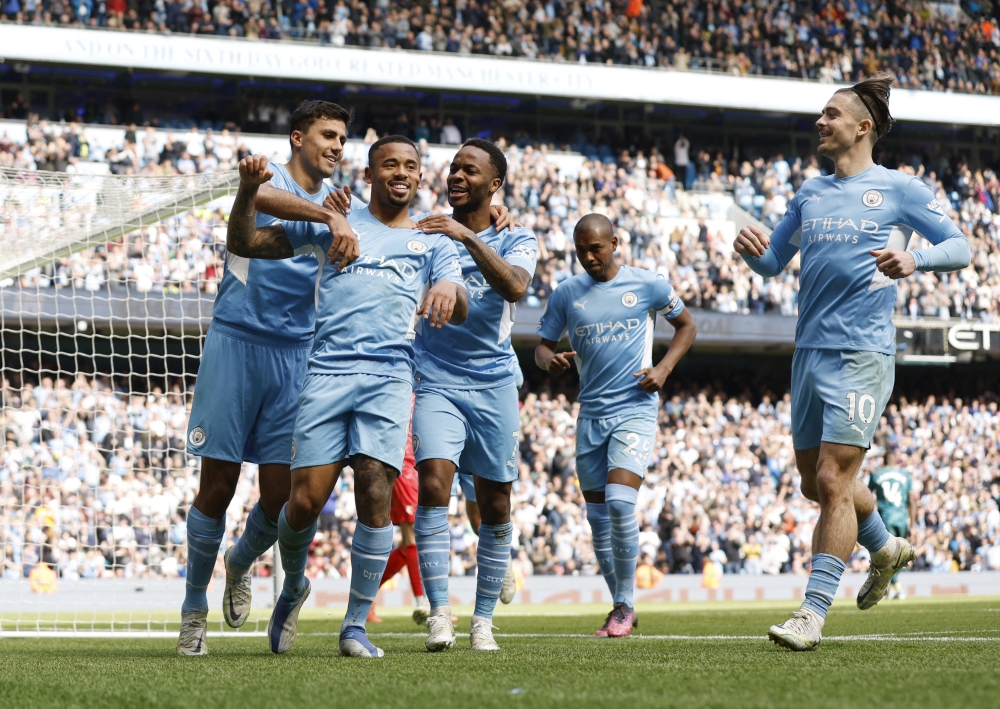 Manchester City's Gabriel Jesus celebrates with teammates after scoring their fourth goal to complete his hat-trick Action Images via Reuters/Jason Cairnduff 