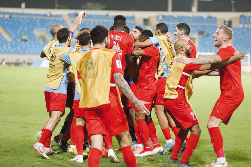 Al Duhail players celebrate after the win on Friday. 
