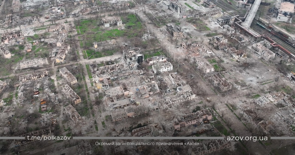An aerial view shows damaged buildings, amid Russia's ongoing invasion of Ukraine, in Mariupol, Ukraine in this handout picture taken with a drone released April 24, 2022. Azov/Handout via REUTERS 