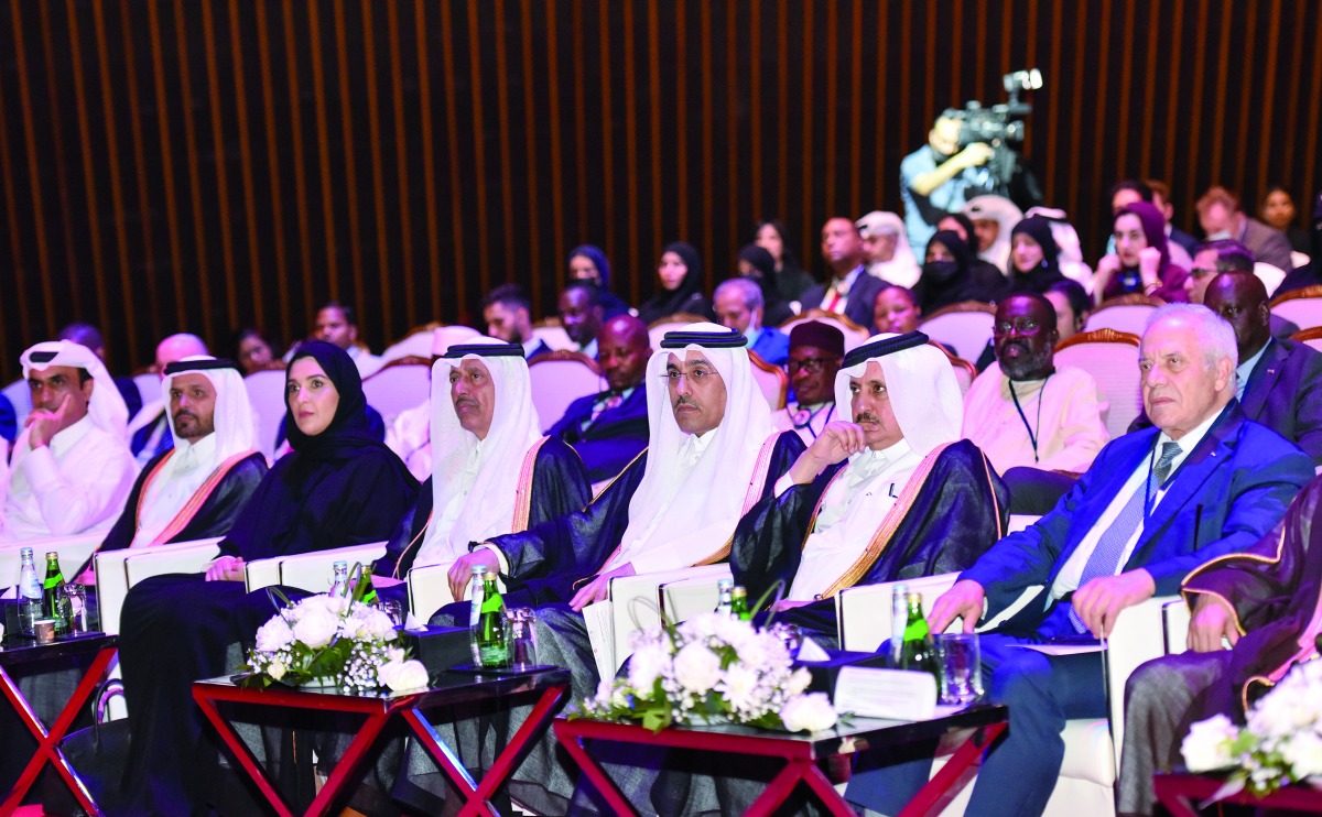 Minister of Labour H E Dr. Ali bin Smaikh Al Marri, Chairperson of the National Human Rights Committee Maryam Abdullah Al Attiyah, Chairman of Qatar Chamber Sheikh Khalifa bin Jassim Al Thani and other dignitaries during the conference.