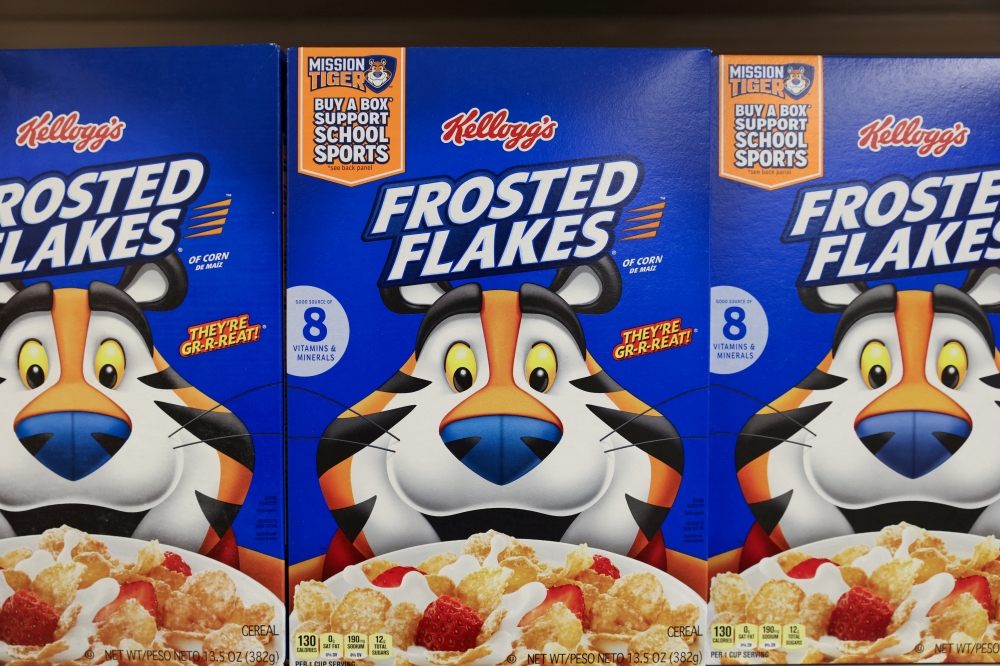 Kellogg's Frosted Flakes, owned by Kellogg Company, is seen for sale in a store in Queens, New York City, U.S., February 7, 2022. REUTERS/Andrew Kelly/File Photo