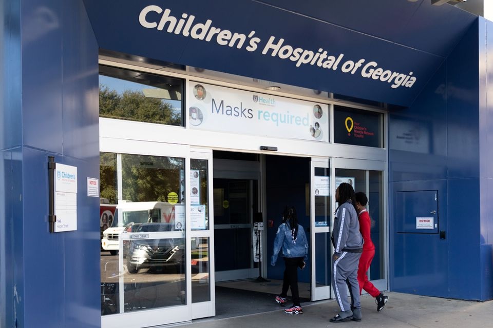 People walk into the Children's Hospital of Georgia in Augusta, Georgia, U.S., January 14, 2022. REUTERS/Hannah Beier

