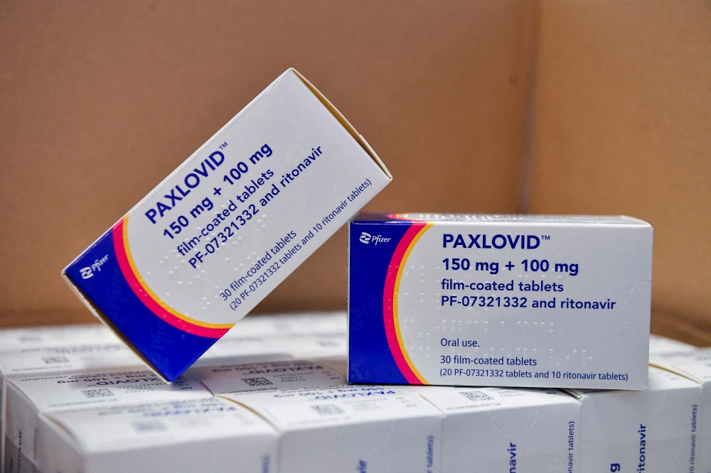Coronavirus disease (COVID-19) treatment pill Paxlovid is seen in boxes, at Misericordia hospital in Grosseto, Italy, February 8, 2022. Reuters/Jennifer Lorenzini/File Photo