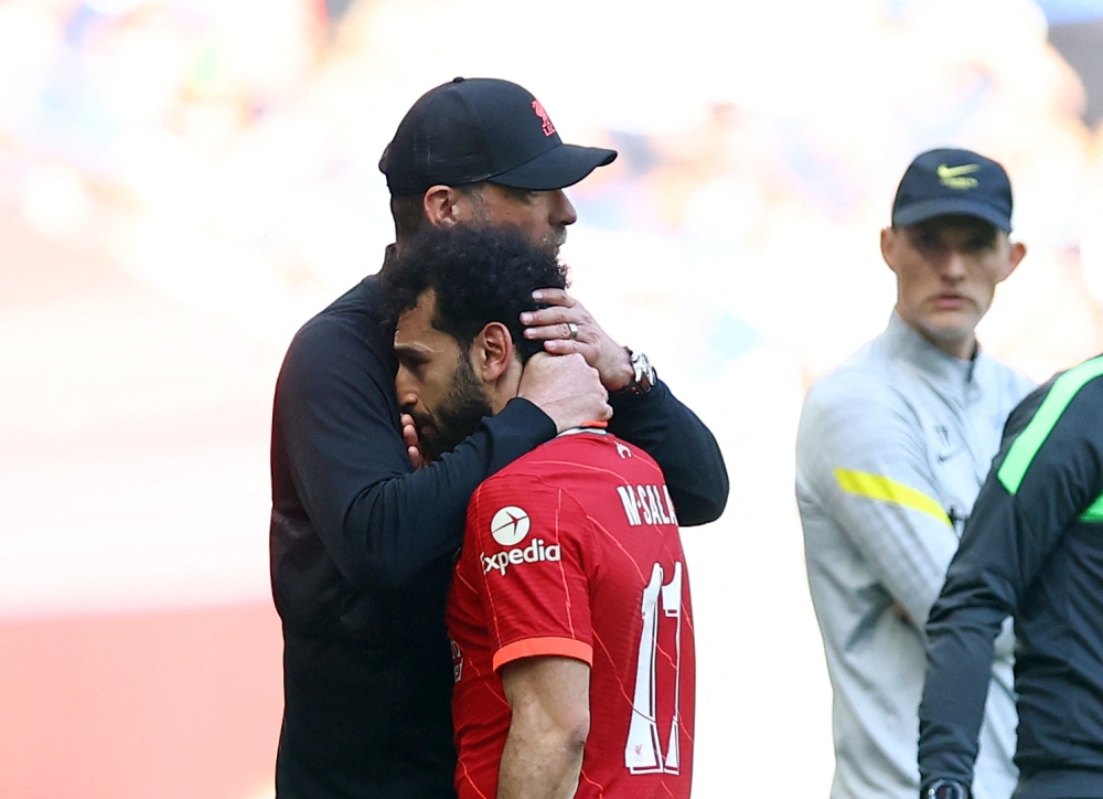Liverpool's Mohamed Salah with manager Juergen Klopp after being substituted REUTERS/Hannah Mckay
