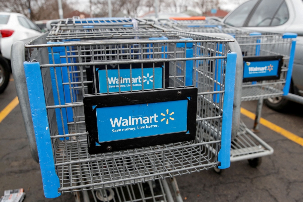 Walmart shopping carts are seen on the parking lot ahead of the Thanksgiving holiday in Chicago, Illinois, U.S. November 27, 2019. REUTERS/Kamil Krzaczynski/File Photo