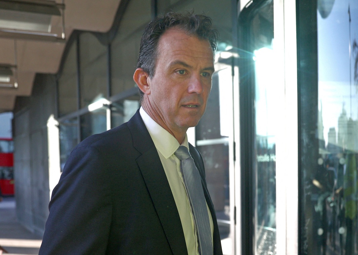 FILE PHOTO: FILE PHOTO: England and Wales Cricket Board (ECB) chief executive Tom Harrison arrives to attend a Digital, Culture, Media and Sport (DCMS) meeting at Portcullis House, in London, Britain, November 16, 2021. REUTERS/Hannah McKay/File Photo/File Photo
