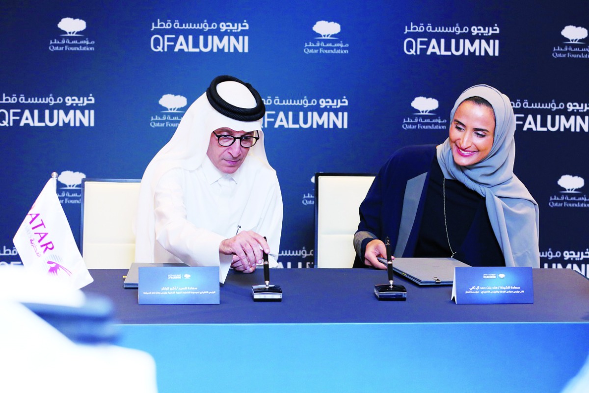 Chairperson and CEO of Qatar Foundation, H E Sheikha Hind bint Hamad Al Thani, and Qatar Airways Group Chief Executive, H E Akbar Al Baker, signing the agreement. 