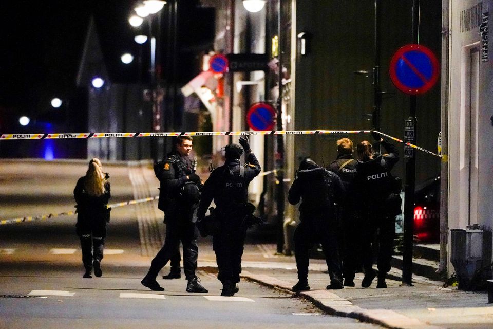 Police officers investigate after several people were killed and others were injured by a man using a bow and arrows to carry out attacks, in Kongsberg, Norway, October 13, 2021. Hakon Mosvold/NTB/via REUTERS/File Photo

