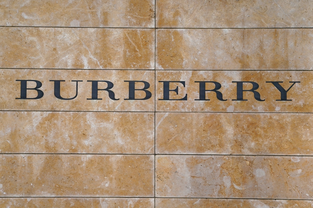 A Burberry logo is seen outside the store on 5th Ave in New York, New York, U.S., March 19, 2019. REUTERS/Carlo Allegri/File Photo