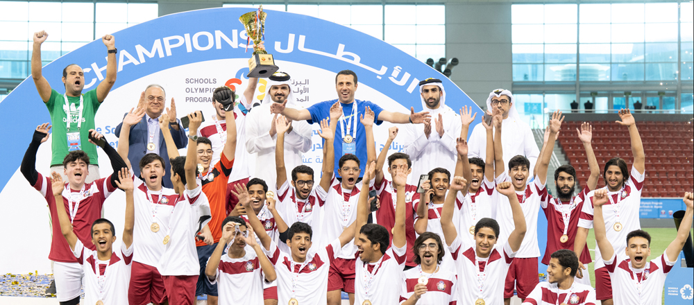 Qatar Olympic Committee President H E Sheikh Joaan bin Hamad Al Thani with the winners of boys events at the conclusion of the 15th Schools Olympic Program at the Aspire Dome, yesterday.
