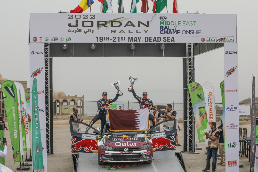 Qatar's Nasser Saleh Al Attiyah and his navigator Mathieu Baumel celebrate their victory.