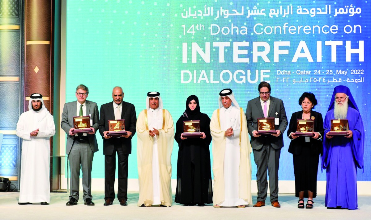 Minister of State for Foreign Affairs H E Sultan bin Saad Al Muraikhi and Chairman of the Board of Directors of Doha International Center for Interfaith Dialogue (DICID), Dr. Ibrahim bin Saleh Al Nuaimi with winners of Doha International Award for Interfaith Dialogue 2022. PIC: Abdul Basit