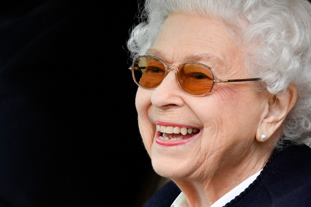 FILE PHOTO: Britain's Queen Elizabeth reacts as she watches horses competing on the second day of the Royal Windsor Horse Show and Platinum Jubilee Celebration in Windsor, Britain, May 13, 2022. REUTERS/Toby Melville/File Photo
