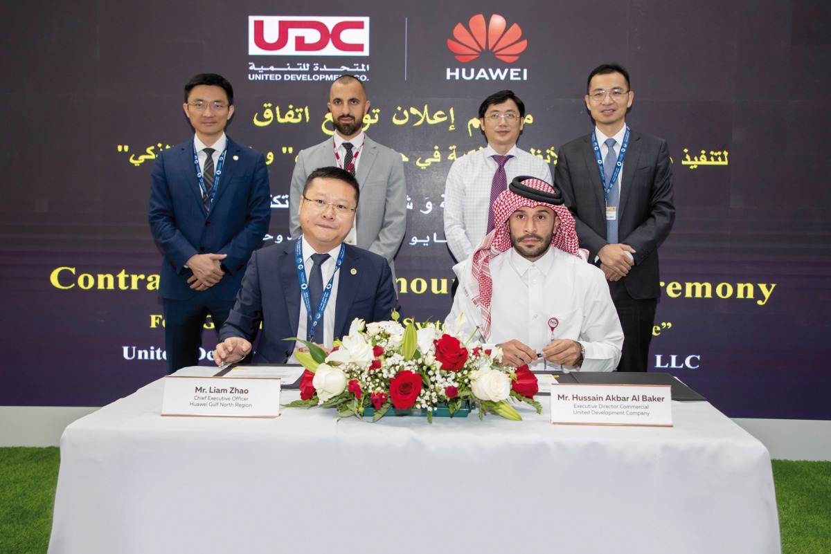 President of Huawei Gulf North Liam Zhao and UDC Executive Director Commercial Hussain Akbar Al Baker with other officials during the agreement signing ceremony.