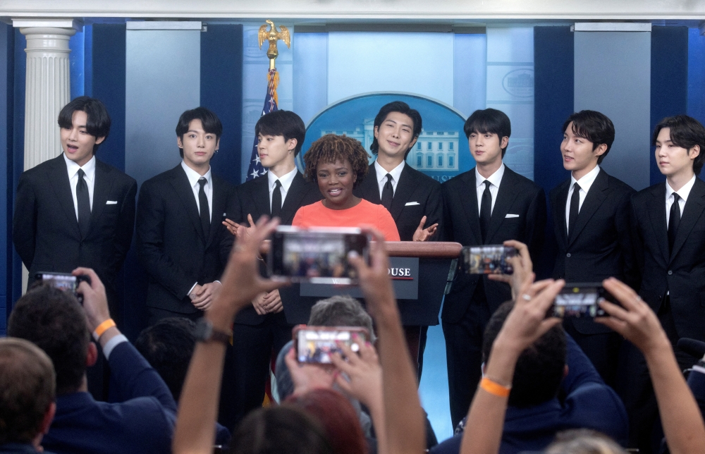White House Press Secretary Karine Jean-Pierre introduces members of the K-Pop band BTS (not in order) Kim Taehyung, Kim Seokjin, Jeon Jeongguk, Kim Namjoon, Park Jimin, Jung Hoseok and Min Yoon-gi. Reuters/Leah Millis