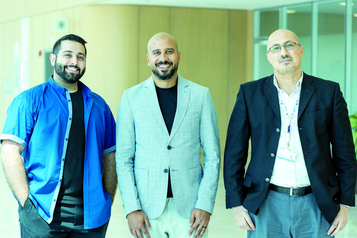 QCRI and ADGS Computer Systems officials.