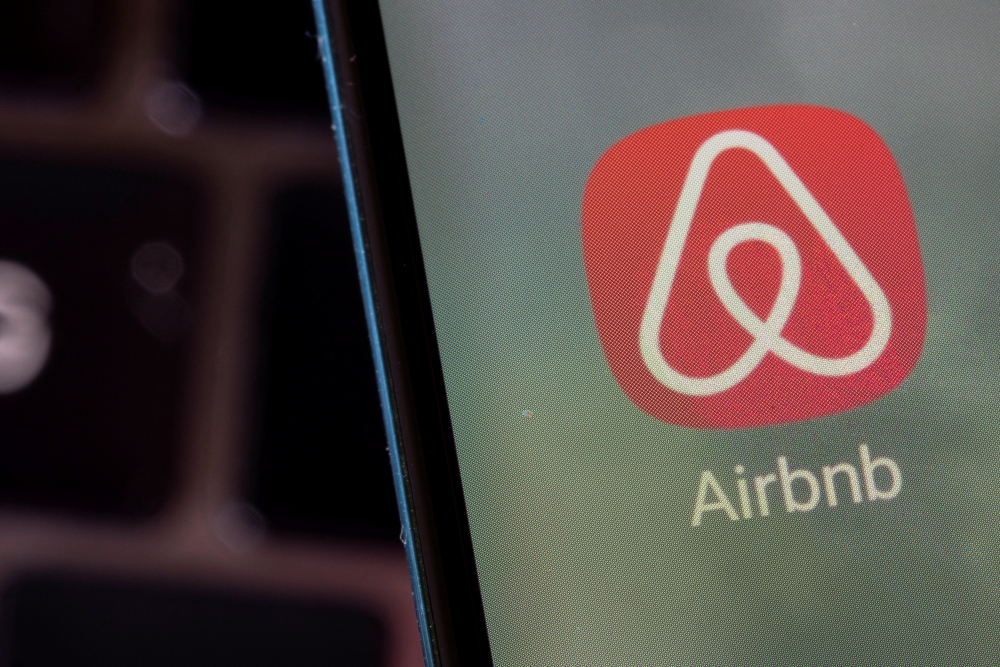 Airbnb app is seen on a smartphone in this illustration taken, February 27, 2022. REUTERS/Dado Ruvic/Illustration/File Photo