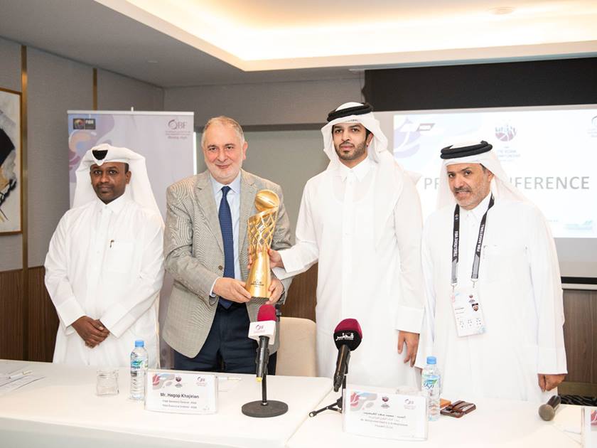 Qatar Basketball Association President Mohammed Saad Al Mughaiseeb, Secretary General Saadoun Sabah Al Kuwari, Asian Basketball Federation Secretary General Hagop Kagerian and Tournament Director Mishaal Ahmed Al Enezi pose with the trophy after a press conference yesterday.