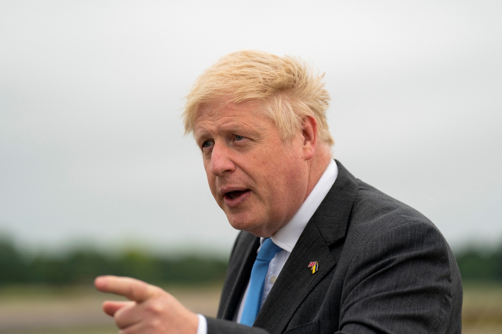 British Prime Minister Boris Johnson arrives at RAF Brize Norton in Oxfordshire, Britain June 18, 2022. Joe Giddens/Pool via REUTERS/File Photo