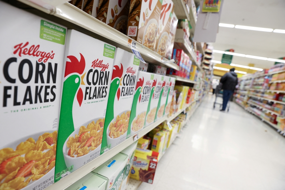 Kellogg's Corn Flakes, owned by Kellogg Company, are seen for sale in a store in Queens, New York City, U.S., February 7, 2022. Reuters/Andrew Kelly/File Photo
