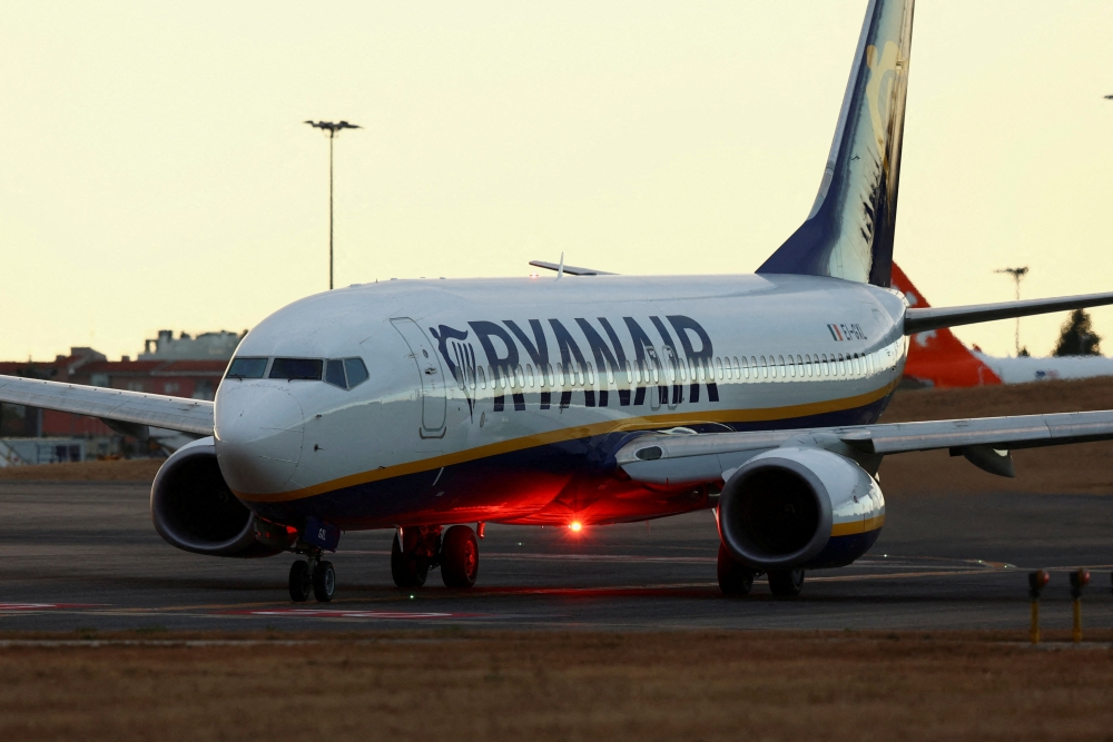 A Ryanair plane prepares to take off from Lisbon Humberto Delgado Airport on the first of three days cabin crew strike in Lisbon, Portugal, on June 24, 2022. (Reuters/Pedro Nunes/File Photo)