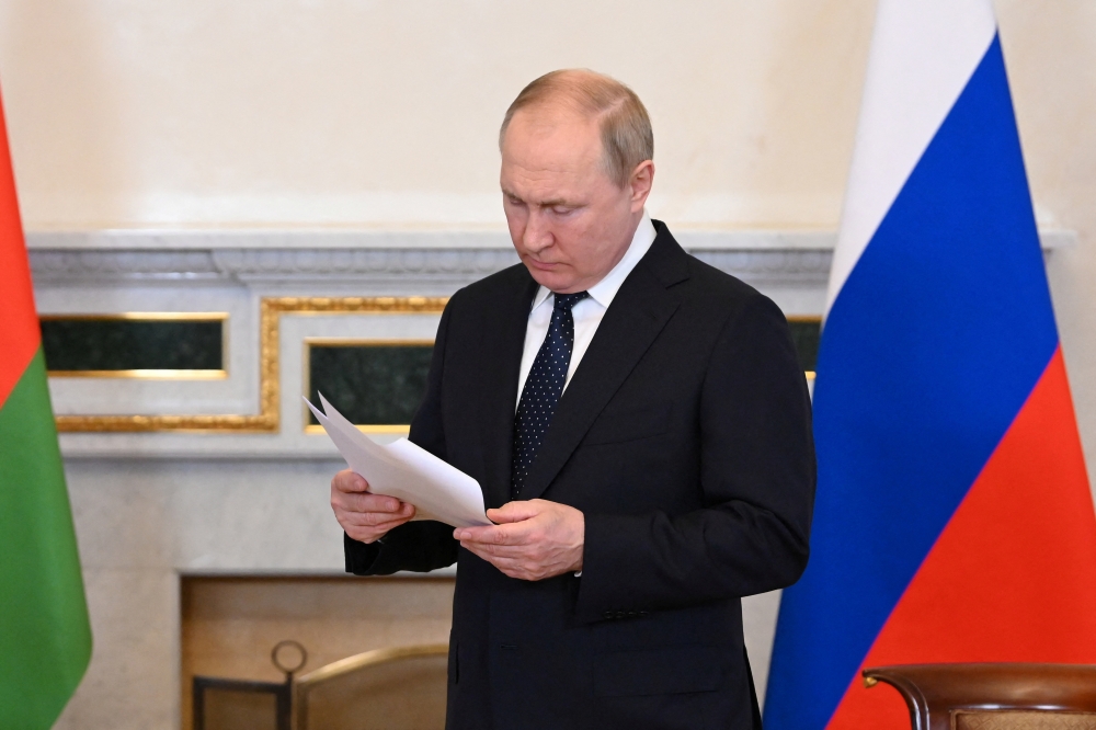 Russian President Vladimir Putin attends a meeting with his Belarusian counterpart Alexander Lukashenko in Saint Petersburg, Russia, on June 25, 2022. (Reuters)