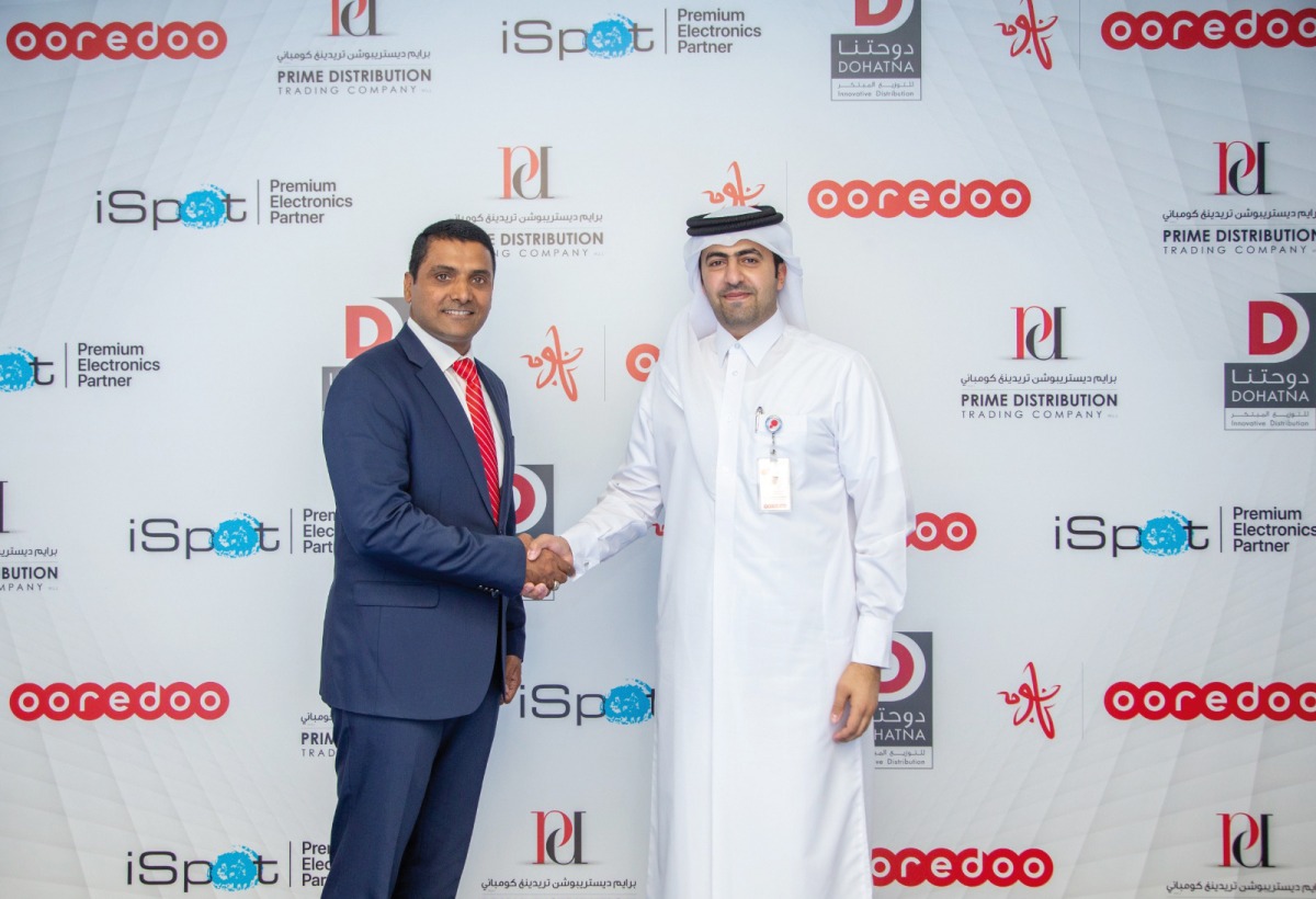Sabah Rabiah Al Kuwari, Director PR at Ooredoo (right) and Mohammad Imran, General Manager of Dohatna Innovative Distribution and PDTC.
