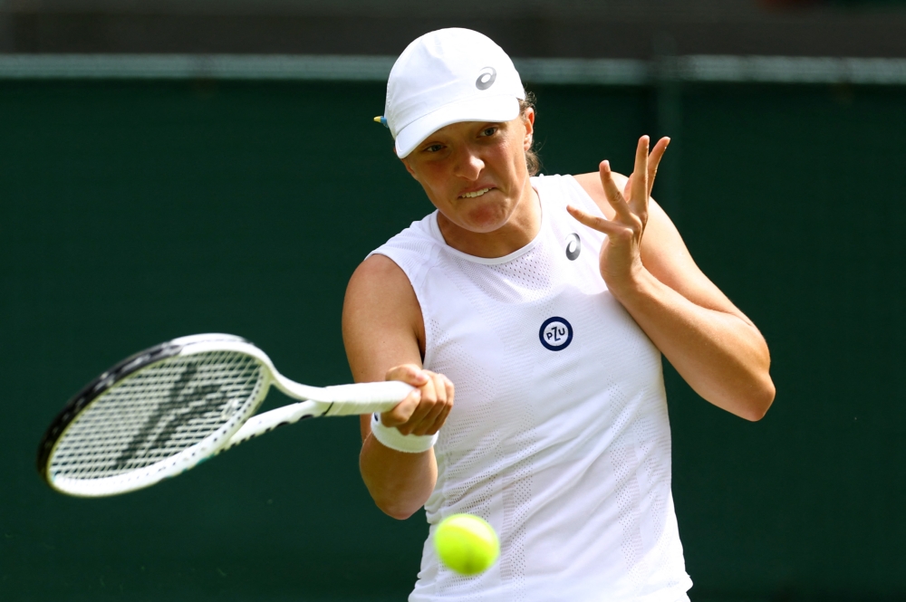 Poland's Iga Swiatek in action during her second round match against Netherlands' Lesley Pattinama Kerkhove (REUTERS/Hannah Mckay)