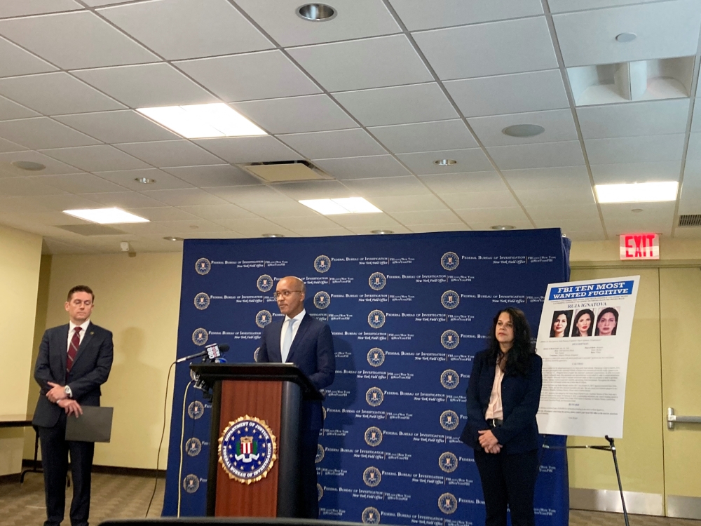 Damian Williams, the top federal prosecutor in Manhattan, speaks at a press conference to announce the addition of 