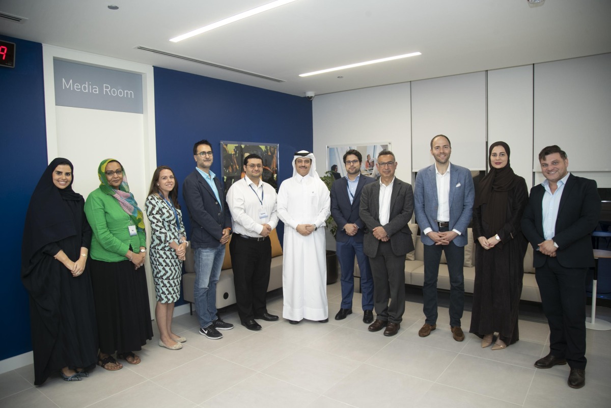 Sheikh Dr. Mohammed bin Hamad Al Thani (center), Director of Public Health Department at Ministry of Public Health, with other official during the program.