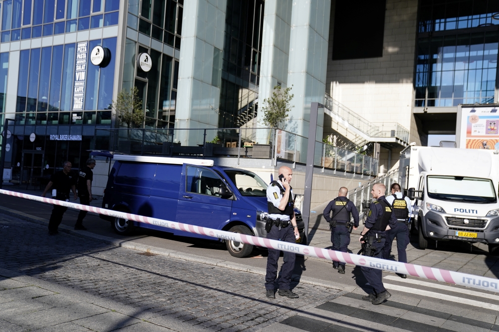 Police officers investigate outside Field's shopping centre, a day after a shooting occurred at the mall, in Copenhagen, Denmark July 4, 2022. Ritzau Scanpix/Mads Claus Rasmussen via REUTERS 